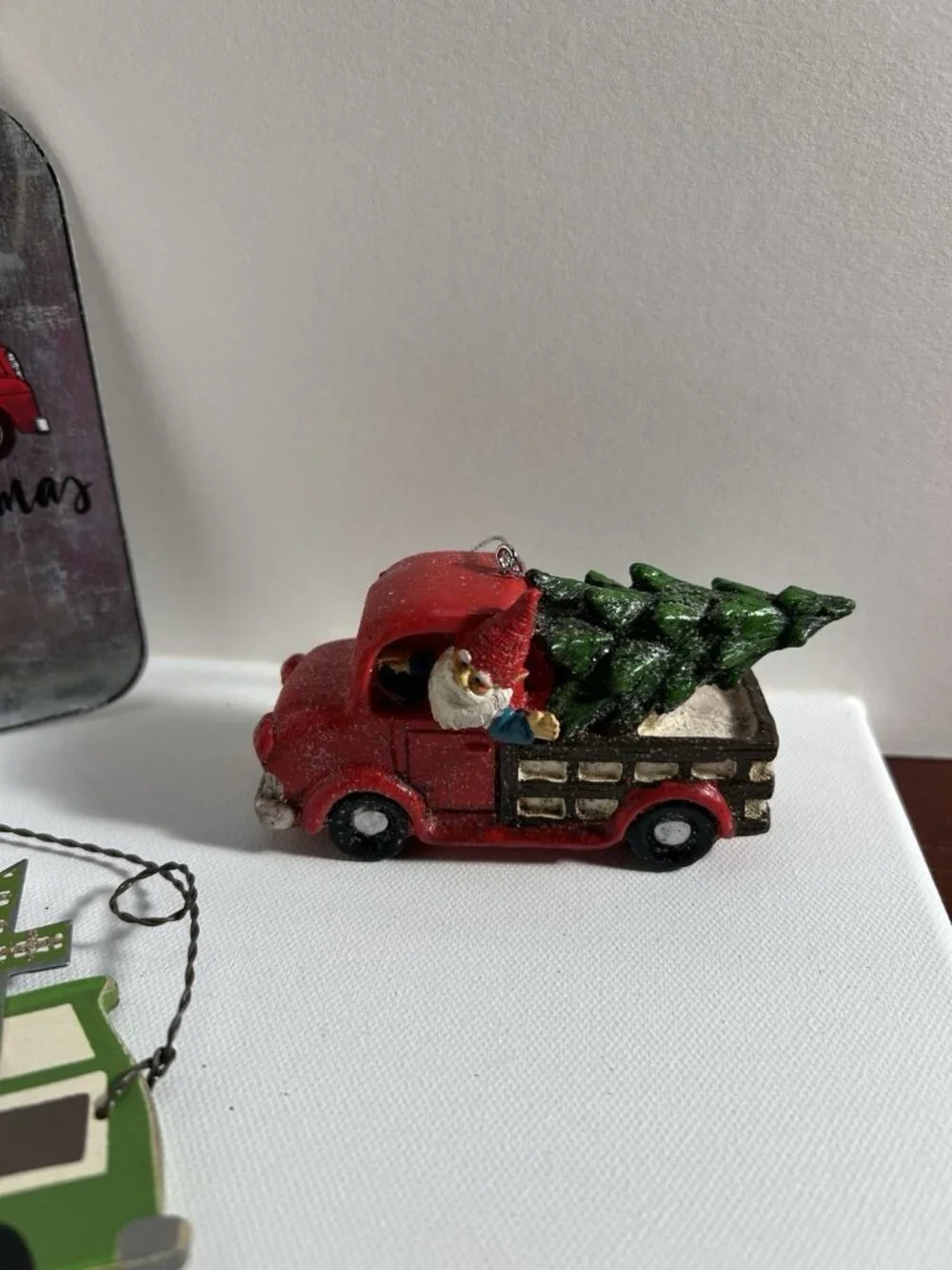 2 Red Truck Ornaments And One Green Vintage Look Car Ornament